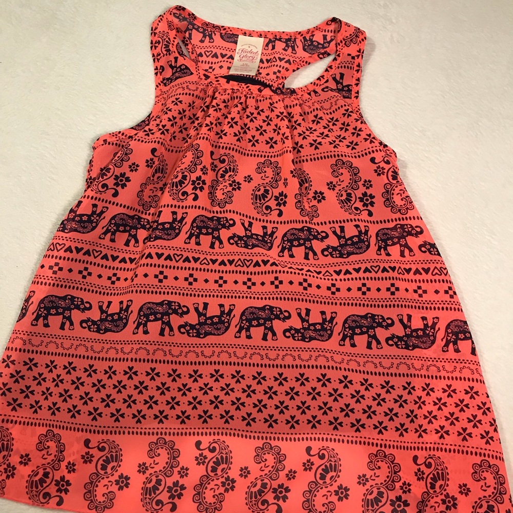 A bright pink and navy blue elephant shirt